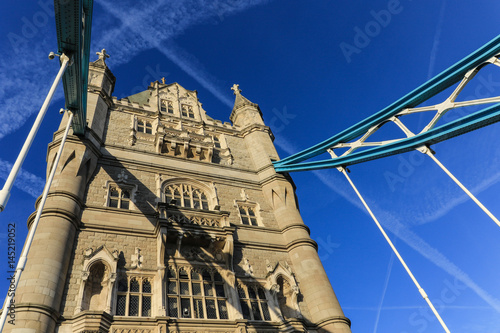 Close up of the Tower Bridge standing underneath one of the entrances