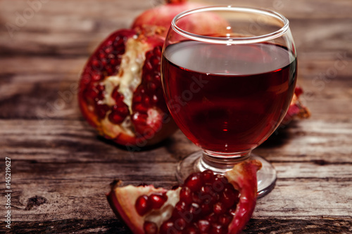Close shot of glass with pomegranate juice