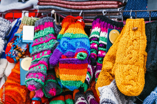 Knitted mittens and gloves at the market © EdNurg