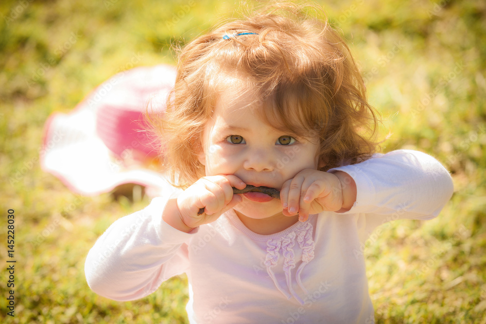 Portrait of baby girl in park