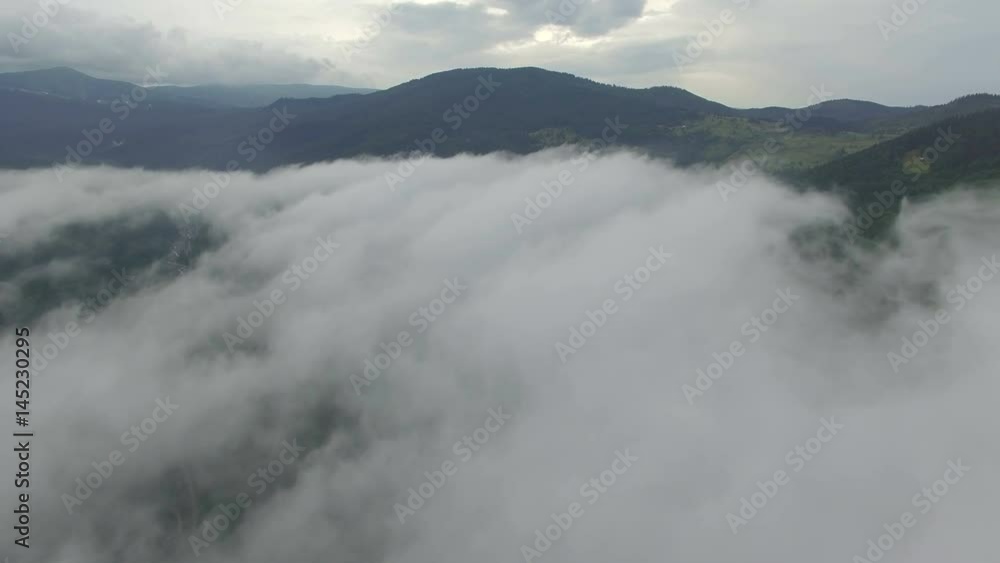 Flying Above The Clouds In The Mountains Flying Above The Clouds In The Mountains