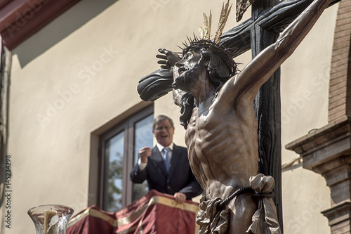 Jesús expirando en la cruz, semana santa en Sevilla, Hermandad del Cachorro photo