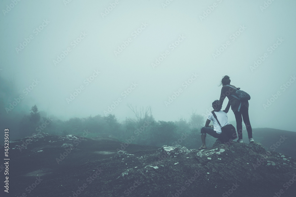 Women and men People love natural forest Full of cloud fog. Women and men People love natural forest Full of cloud fog.