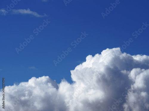 Sky blue with white clouds below background