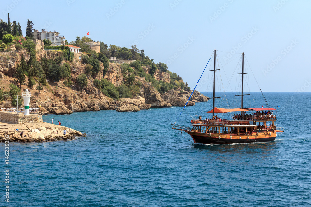 The sailboat arrives at the port of Antalya