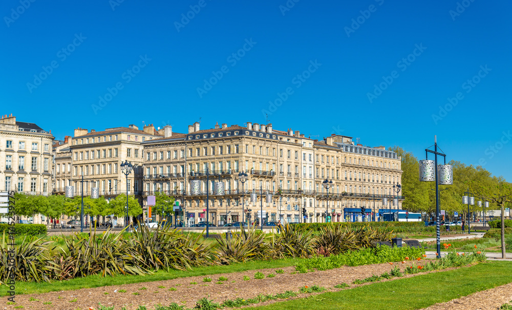 Buildings and garden on Quai Louis XVIII in the historic centre of Bordeaux, France