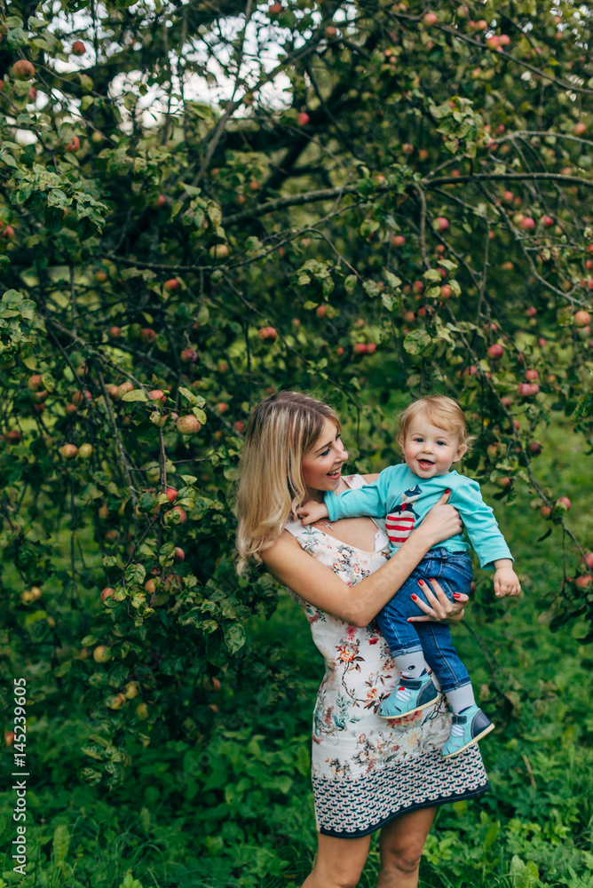 Fototapeta premium Mother with her son on a walk
