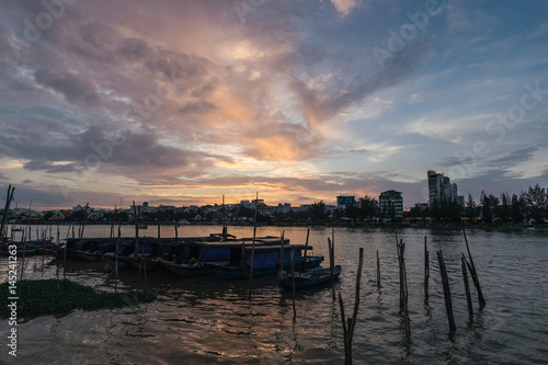 Boats stand on the water at the bay in the evening