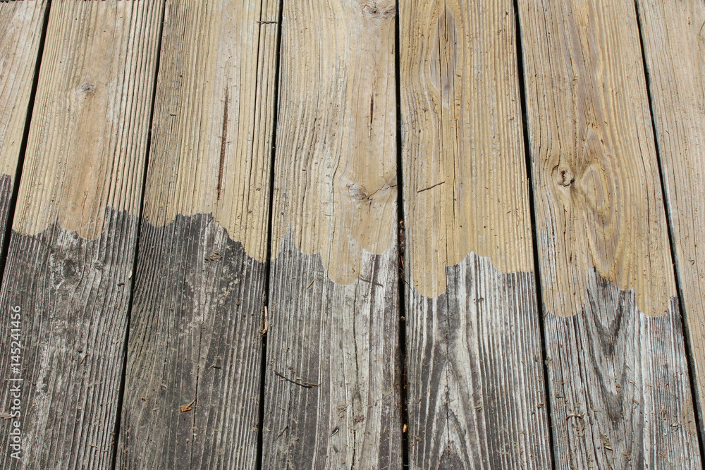 Obraz premium Pressure washed wood with uneven border 