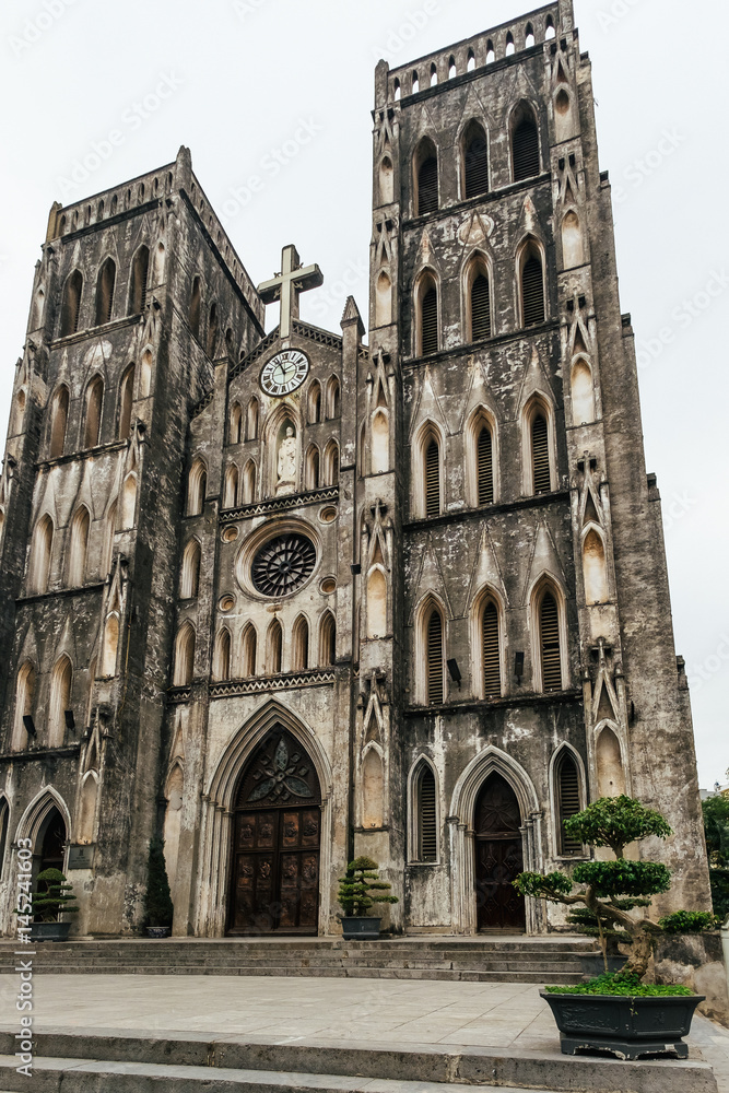 Fototapeta premium Gothic church with clock on the top