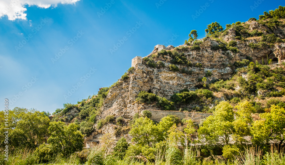 2016 Albania Berat - City of thousand windows, beautifull view of town on the hill between a lot of trees and blue sky