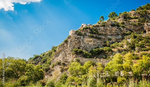 Obraz na płótnie 2016 Albania Berat - City of thousand windows, beautifull view of town on the hill between a lot of trees and blue sky w salonie