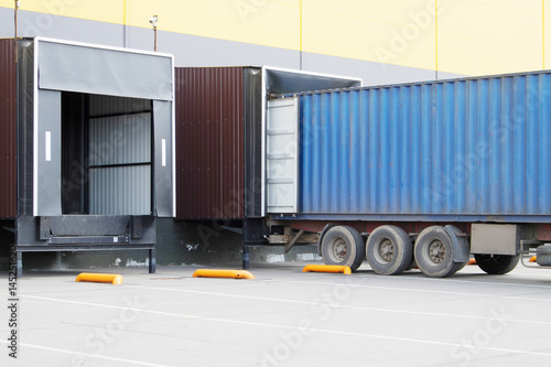 loading operations at a warehouse terminal. loading of the container on the truck.