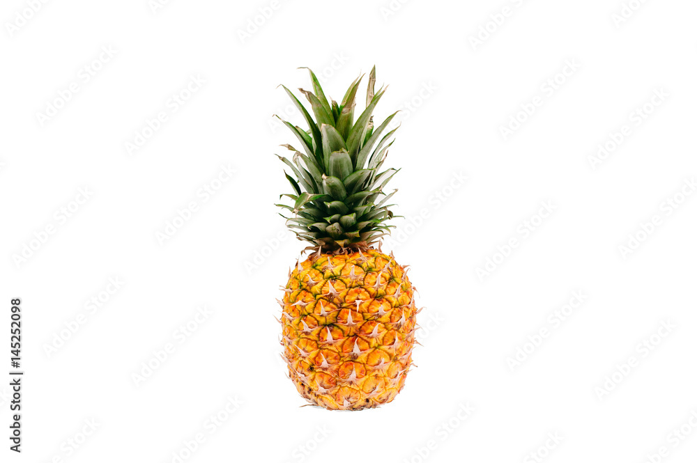 Whole ripe pineapple isolated on white background closeup. Tropical fruit. Whole ripe pineapple isolated on white background closeup. Tropical fruit.