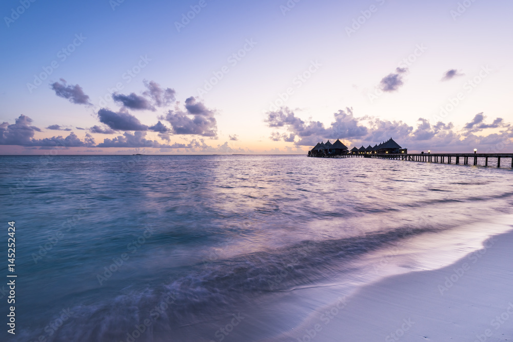 Ari Atoll. Luxury resort in the Indian Ocean. Relax evening, sunset over the ocean. Maldives. Ari Atoll.