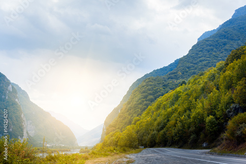 Cinematic road landscape. Road throuth the mountains