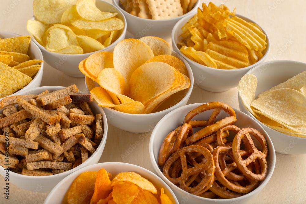 Pretzels in bowls on wooden table from above Pretzels in bowls on wooden table from above