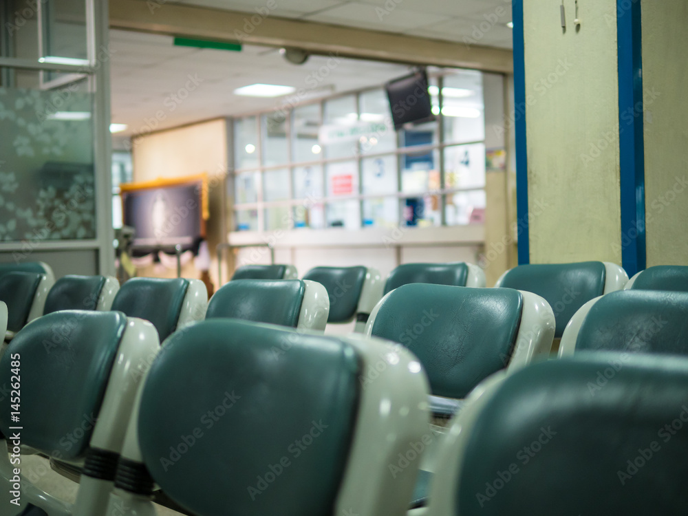 a row of chairs in the hospital a row of chairs in the hospital
