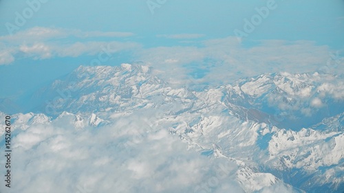 The Alps mountains and clouds, aeial view