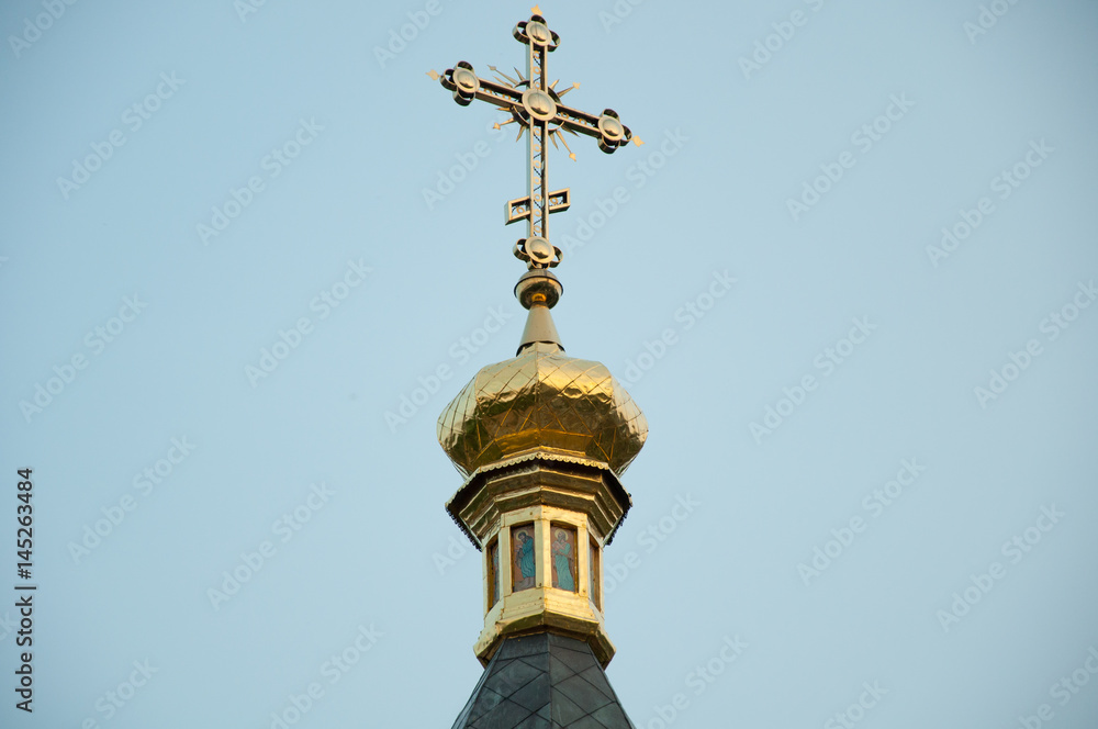 Dome of the church on the sky background