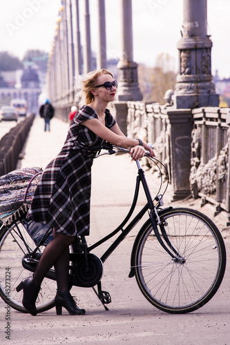 Blonde girl and retro bike