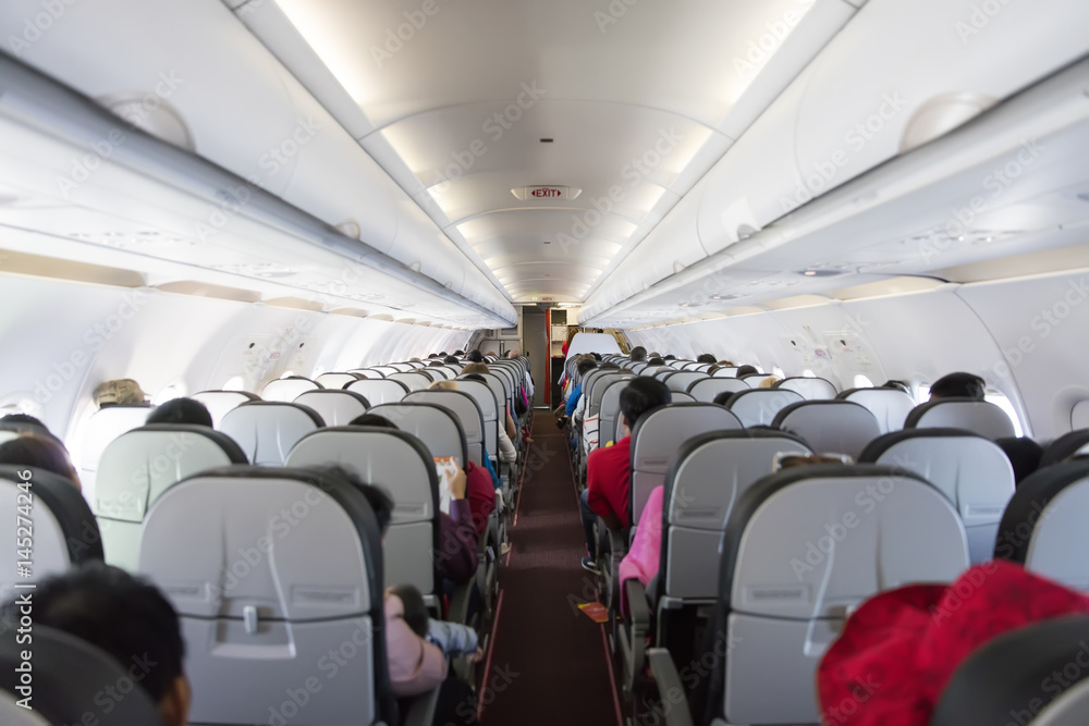 Fototapeta premium Passengers in airplane
