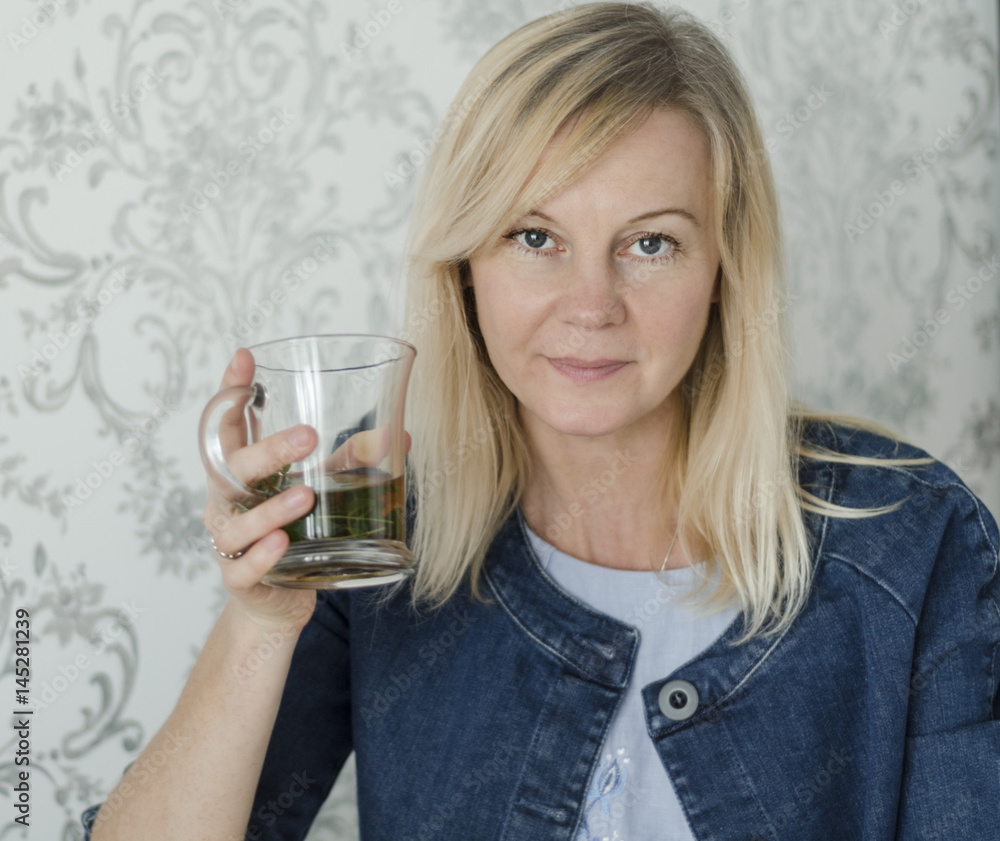 Woman in the morning drinking tea Woman in the morning drinking tea