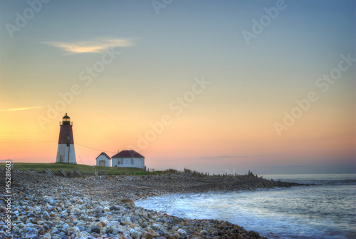 Lighthouse at sunrise photo