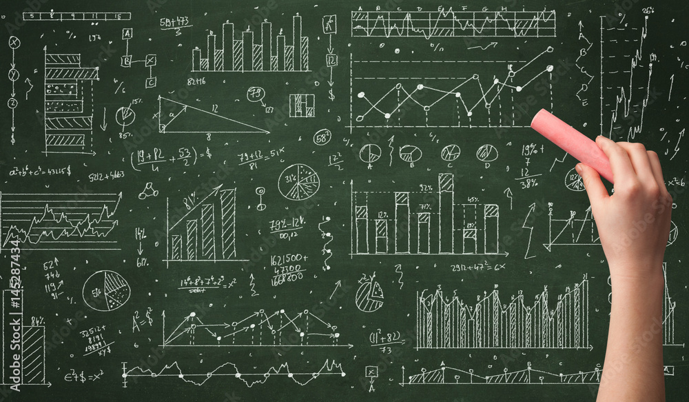 A business person drawing data on chalkboard A business person drawing data on chalkboard