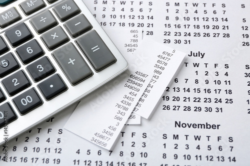 Calculator on calendar. Tax concept