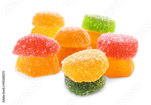 Tasty jelly candies on white background