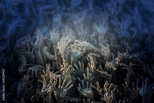 Cuadro en lienzo Hands reach up from the underworld.