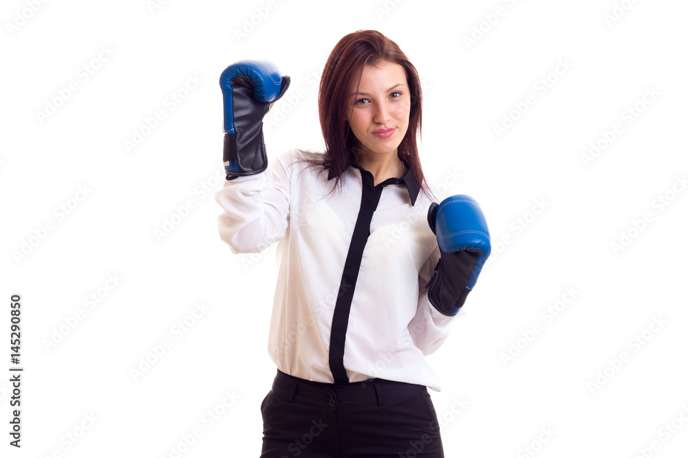Young businesswoman in boxing gloves Young businesswoman in boxing gloves