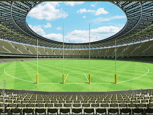 3D render of a round Australian rules football stadium with  green gray seats and VIP boxes