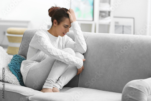 Young woman suffering from ...