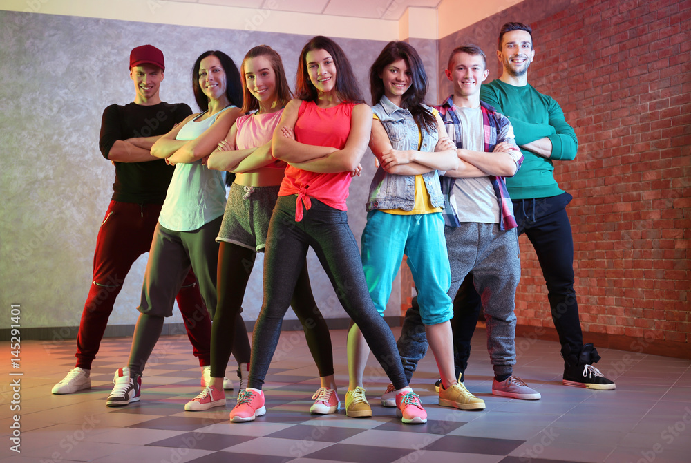 Fototapeta premium Group of young hip-hop dancers in studio