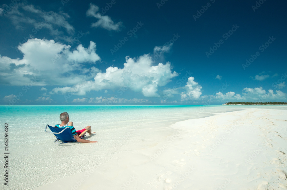 Man at Sandy Cay, Bahamas