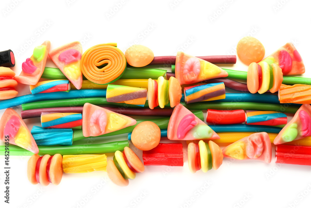 Composition of colorful jelly candies on white background