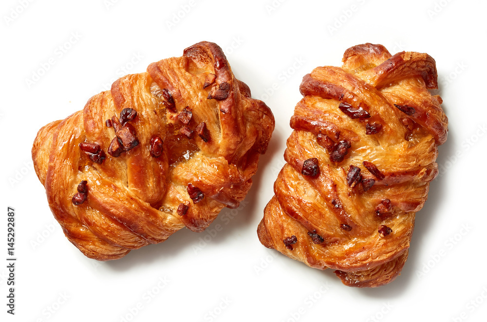freshly baked pecan buns isolated on white freshly baked pecan buns isolated on white