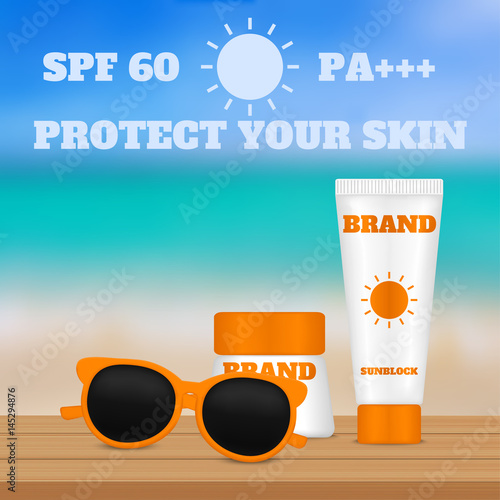 Sunscreen ads template. Tube and a jar with sunscreen on a wooden floor. Blurred beach background.