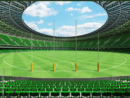3D render of a round Australian rules football stadium with  green seats and VIP boxes