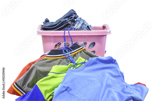 Clothes in plastic basket on white background photo