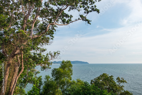 Fototapeta Naklejka Na Ścianę i Meble -  Beautiful tropical seaview from the cliff, cloudy and blue sky background
