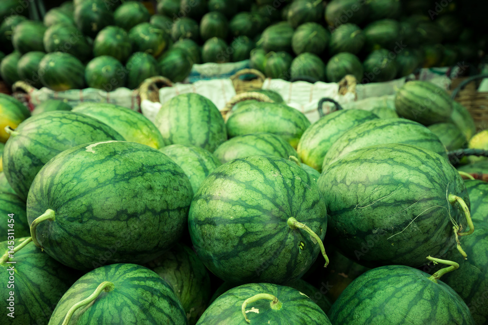 Watermelon in Night market in Bangkok ( Thailand , Asia ) Watermelon in Night market in Bangkok ( Thailand , Asia )