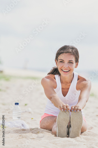 healthy woman doing leg stretching