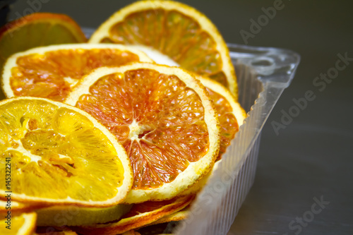 Dried orange and lemon slices background photo