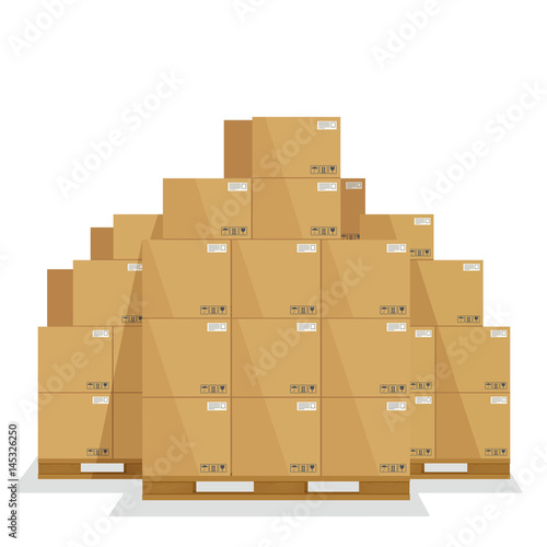 Delivery boxes on a wooden pallet. Cardboard cargo boxes with fragile signs.