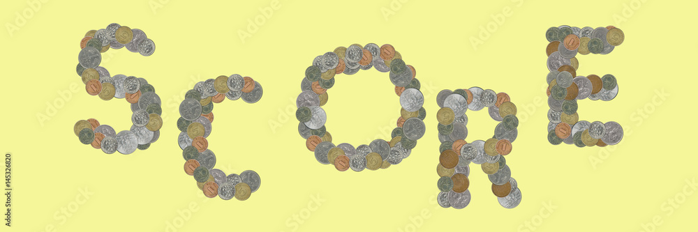 SCORE – Coins on yellow background SCORE – Coins on yellow background