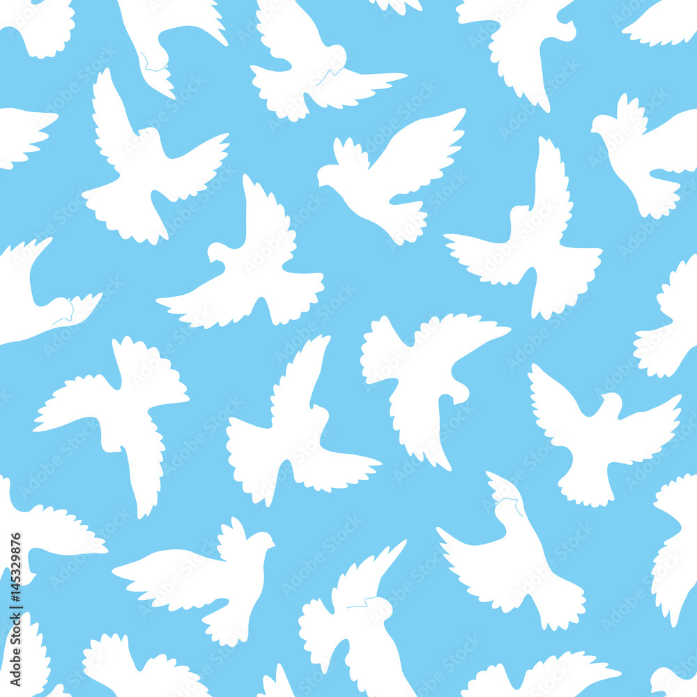 White doves seamless pattern on a blue background. White doves seamless pattern on a blue background.