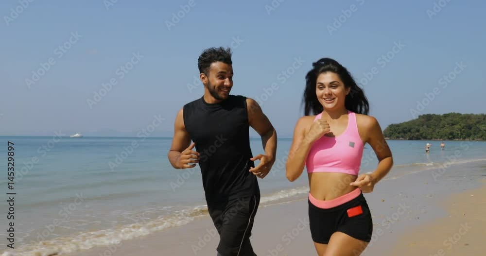 Running Hispanic Man And Woman On Beach Talking Young Couple Athlete Jogging Training Outdoors Exercising On Sea Working Out Slow Motion 60 Running Hispanic Man And Woman On Beach Talking Young Couple Athlete Jogging Training Outdoors Exercising On Sea Working Out Slow Motion 60